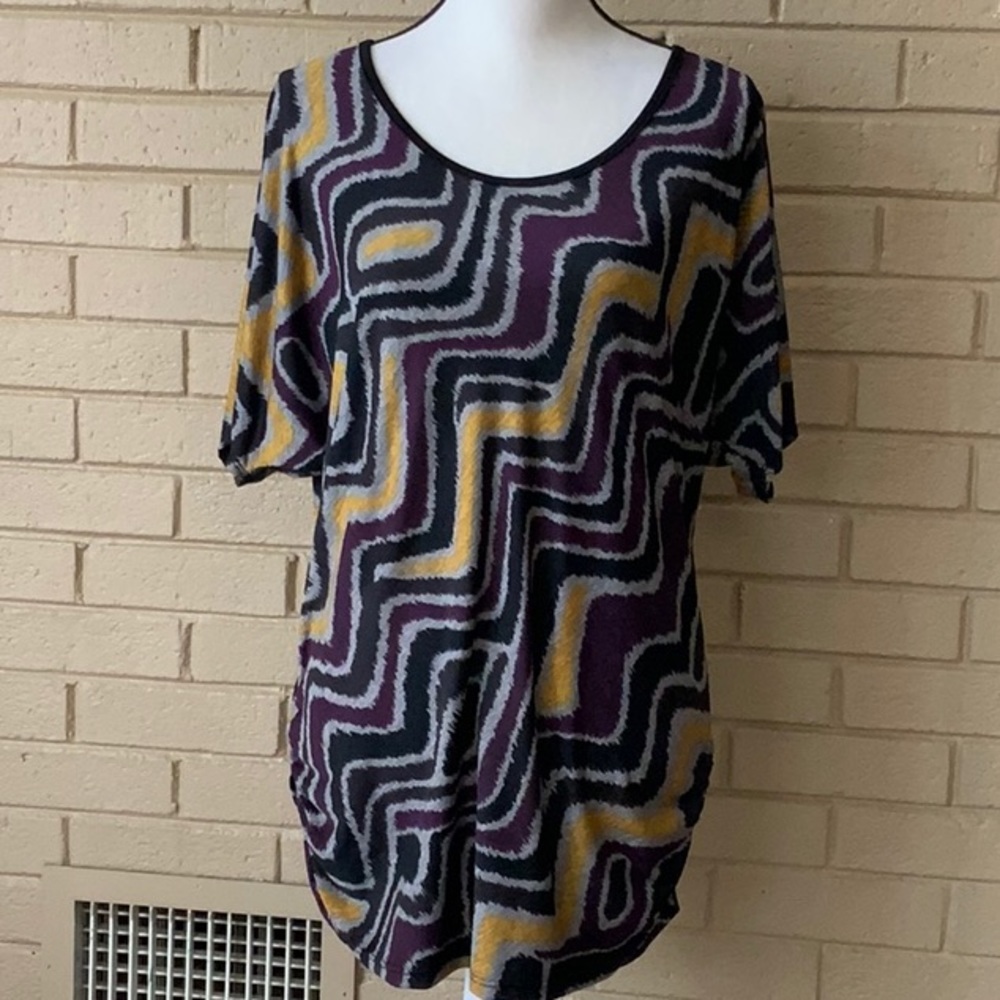 Lavish  Tunic can be worn as mini or top 100% poly
